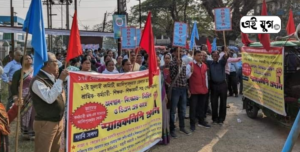 Alipurduar: বকেয়া ডি এ র দাবিতে বারোই জুলাই কমিটির ডাকে অবস্থান বিক্ষোভ ও ডি এম কে ডেপুটেশন